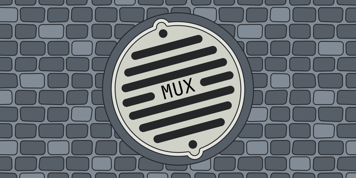 Mux manhole cover on brick road
